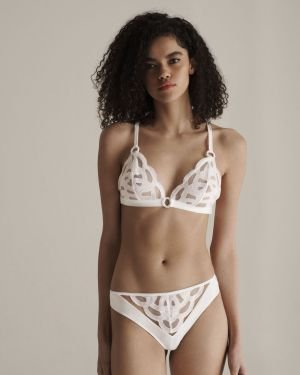 Exquisite embroidered totem slightly exposed hip shorts