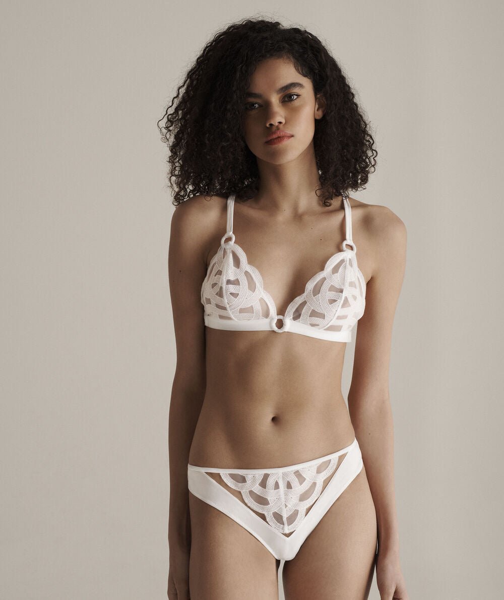 Exquisite embroidered totem slightly exposed hip shorts